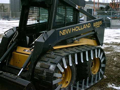 cleats for skid steer tracks|skid steer snow tracks.